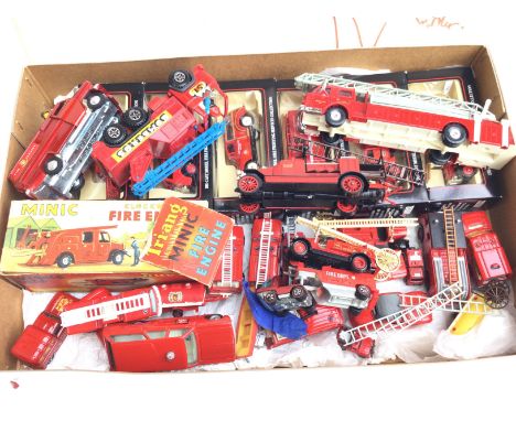 A Box Containing Diecast Fire engines including a Tri-and Minic Fire Engine.
