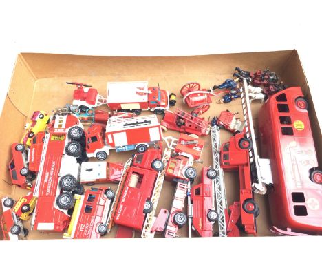 A Box Containing Loose Diecast Fire Engines and 1 Tinplate Clockwork Engine.