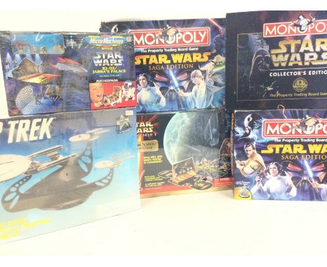 A Collection of Star Wars Board Games. A Star Trek model Kit and Star Wars Micro Machines.