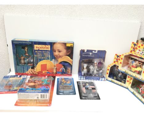 A collection of 9 unopened model and playsets.  Includes Disney and Noddy items.
