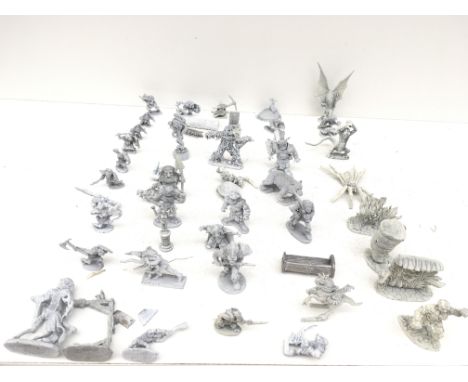 A box containing 50 metal model figures and accessories from a Warhammer collection. Made by Pal Ratha..Grenadier etc all are