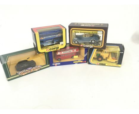 A collection of 5x boxed Corgi diecast model vehicles including buses and roller NO RESERVE