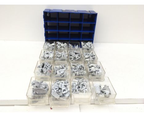 A 12 drawer storage unit containing metal model figures from a warhammer collection. Unpainted. Made by Grenadier and others.