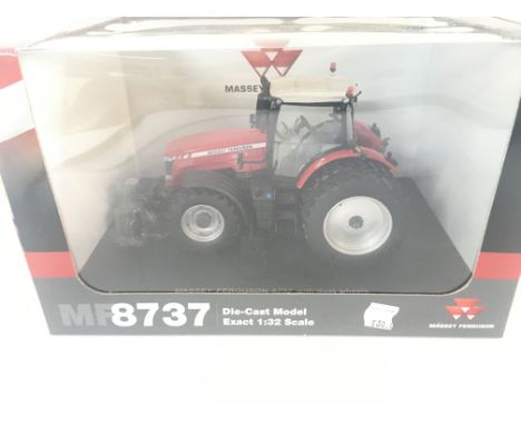 A Boxed Universal hobbies 8737 Massey Ferguson Tractor