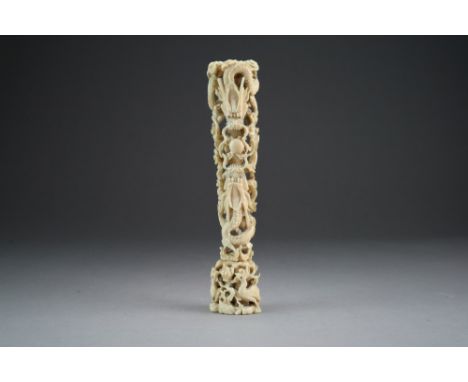 A Chinese ivory carving of dragons, Qing Dynasty, modelled as two dragons in wrythen poses amid rolling clouds, facing each o