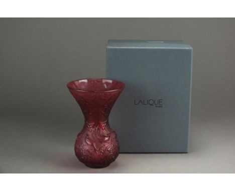 A Lalique Crystal Arabesque vase in ruby, with engraved crystal birds playing amongst frosted leaves, engraved Lalique France