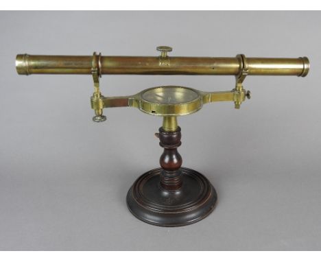 A 19th century lacquered brass surveyors level by W and S Jones, London, 19'' tube above a glazed compass with 4'' silvered d