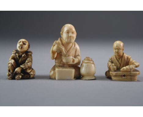 Three Japanese ivory netsuke, Meiji period, modelled as a street artisan, 4cm, a street fishmonger, 3cm, and a seated man tyi