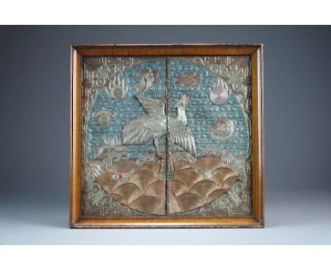 A Chinese silver and gilt thread lady's rank badge, Qing Dynasty, of the 5th civil rank, the square panel worked in couched s