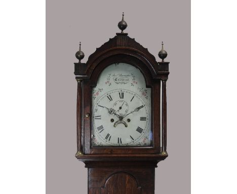 Joss Banister, Colchester, a George III oak cottage longcase clock, early 19th century, the arched hood with shaped pediment 