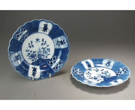 A pair of Caughley fluted plates in the Holed or Flaming rock pattern, circa 1780-82, painted S marks, 22.5cm diameter (one c