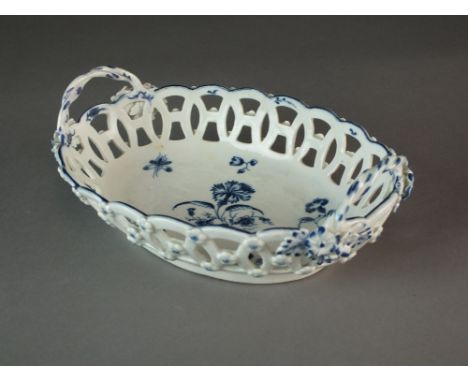 A Caughley oval basket painted in the Gillyflower I pattern, circa 1776-80, with twisted rope handles and applied moulded flo