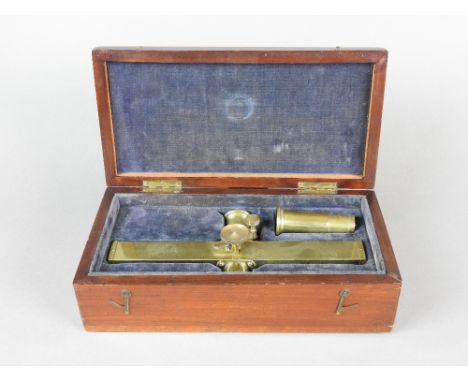 A Corcoran's patent 'The Wedge' optical pyrometer, no. 525, the brass body with detachable eye piece and adjustment scale and