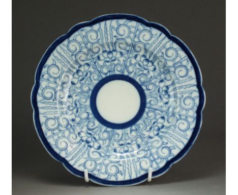 A Caughley dessert plate painted in the Royal Lily pattern, circa 1785-92, the reverse further painted with three foliage spr