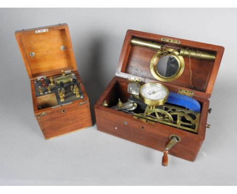 A mahogany cased induction coil electric shock machine, 1920s, with drawer to the side containing screw thread pads, handles 