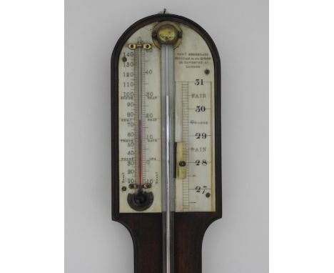 A mahogany stick barometer, early 19th century, the arched top above an ivory scale with barometer and retailers mark for Tho