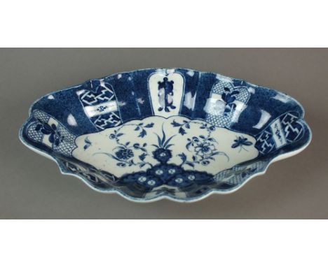 A Caughley powder blue dessert centre dish painted in the Holed Rock pattern, circa 1775-80, C mark, 31cm wideEx Gittins Coll