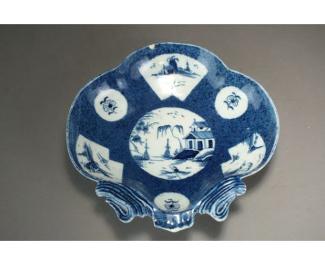 A Caughley powder blue shell dessert dish painted with the Fan Panelled landscape design, 20cm wide, and a Caughley powder bl