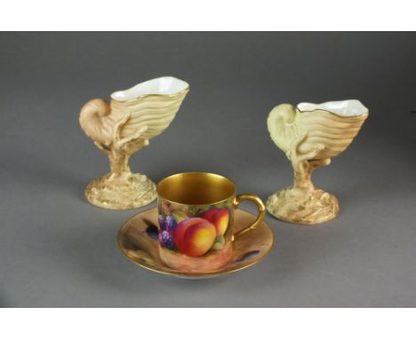 A Royal Worcester fruit-painted coffee cup and saucer, signed Moseley, together with a pair of Royal Worcester blush ivory sh