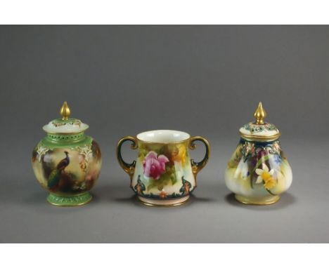 A collection of Royal Worcester comprising a pot pourri vase and cover painted with a peacock by James Hadley, 14cm high, a f