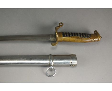 A Victorian Officers' dirk, with brass and leather hilt, in steel scabbard with single suspension ring, blade 33.5cm long, ov