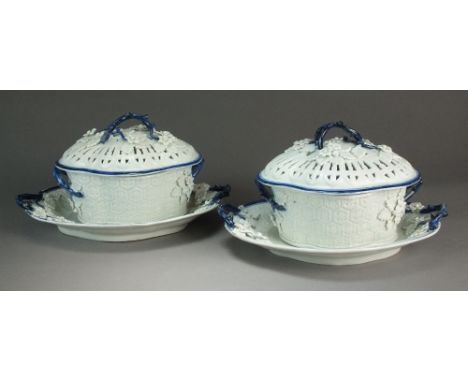 A pair of Caughley chestnut baskets, covers and stands painted with the Salopian Sprig pattern, circa 1780-90, stand 28cm wid