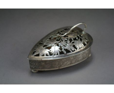 A Chinese silver pot pourri box and cover, signed Gong He, circa 1900, of heart shape and raised on three ball feet, the pier