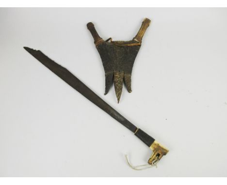 Two Sudanese Daggers in crocodile skin Scabbard, an Indonesian Man Dau and an Indian double Dagger (3)