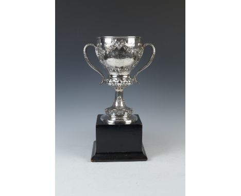 A Victorian silver two-handled Trophy finely embossed battle scene, inscribed "The Golfers Trophy won by "Garrison Beauty" ow