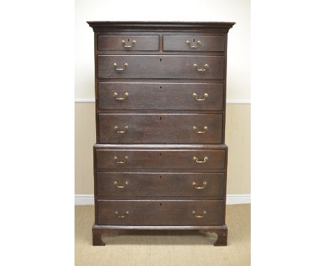 An 18th Century oak Chest on Chest of two short and six long drawers on bracket feet, 3ft 6in