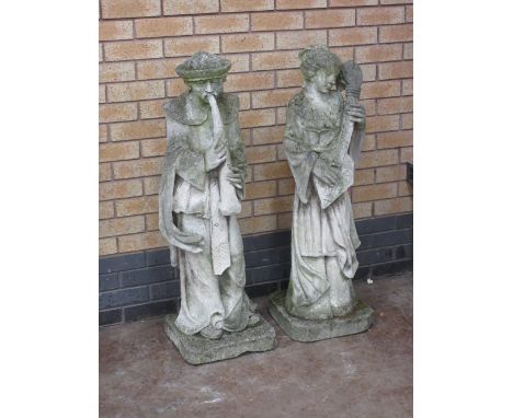 A pair of Garden Figures of Oriental Lady playing mandolin and companion playing pipe, on square bases, 3ft 6in