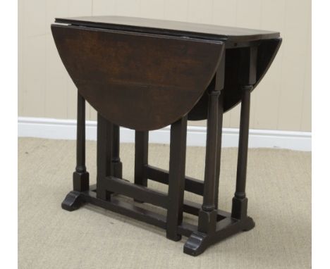 A 17th Century small oak oval Gate-leg Table on straight turned supports with sledge feet, 2ft 7in x 3ft, open