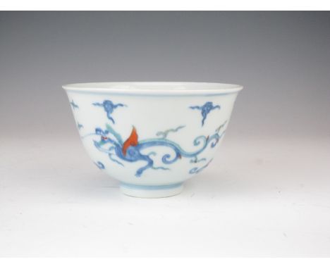 A Chinese doucai porcelain Bowl, Chenghua six-character but probably Kangxi, painted with two ethereal dragons amongst clouds