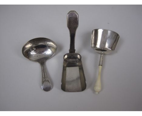 A George III silver Caddy Spoon with bright cut engraving and initials, London 1798, fiddle pattern Caddy Spoon, London 1833,