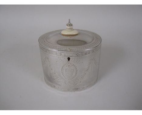 A George III silver oval Tea Caddy engraved floral swags, oval cartouche, London 1784, maker: Jos Leteuna