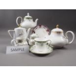 A Royal Doulton "Gold Lace" part combination service, a Royal Doulton "Ashmont" pattern teaset for