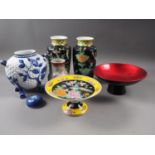 A pair of famille noire vases with bird decoration, 9 1/2" high, a crackle glazed vase, 6" high, a
