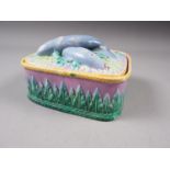 A George Jones Majolica sardine dish and cover, 6" wide (cover restored)