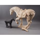 A Tang style terracotta horse, 14 1/2", (damages to tail), and another smaller similar
