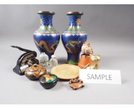 A pair of cloisonne vases, 9 1/2" high, a carved wood netsuke of two frogs on a lily pad, a painted blind stamp and other col