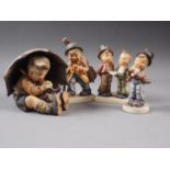 Four Hummel figures