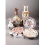 *A pair of Chinese famille rose octagonal plates with floral decoration, 9" dia, a bulbous bottle