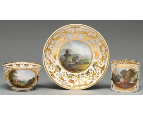 A Derby coffee can, teacup and saucer, c1820, painted by Daniel Lucas or another, with a landscape and gilt, saucer 14.5cm di