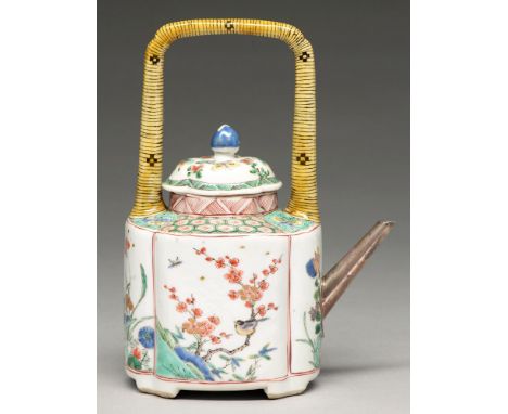 A Chinese famille verte wine pot and cover, Kangxi period, enamelled and gilt with panels of flowering plants and insects, th