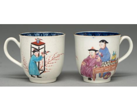 Two Worcester coffee cups, c1765, with underglaze blue border and painted with three Chinese figures, 65 and 66mm h Undamaged