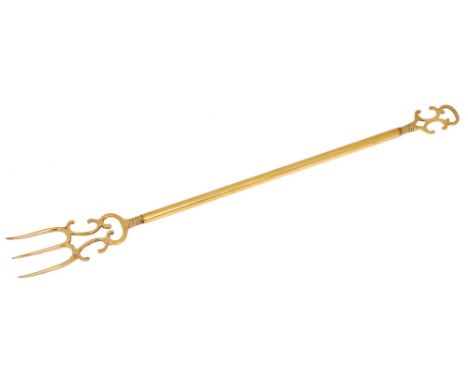 A Victorian brass toasting fork, 60cm l Light wear but undamaged, no repair