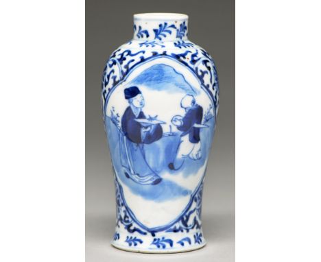 A Chinese blue and white vase, 19th / 20th c, painted with a sage and attendant before a mountain, 13.5cm h, Kangxi mark in u