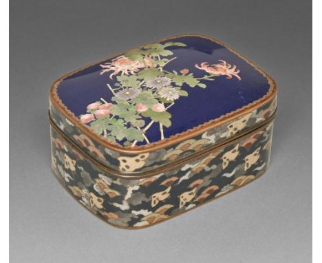 A Japanese cloisonne enamel box and cover, Meiji period, enamelled with chrysanthemums on a trellis, the sides with birds and