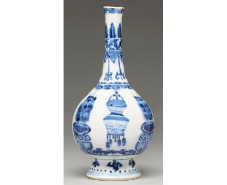 A Chinese blue and white vase, 19th c,&nbsp;in Kangxi style, painted with dragons and cords and hanging vessels alternating w