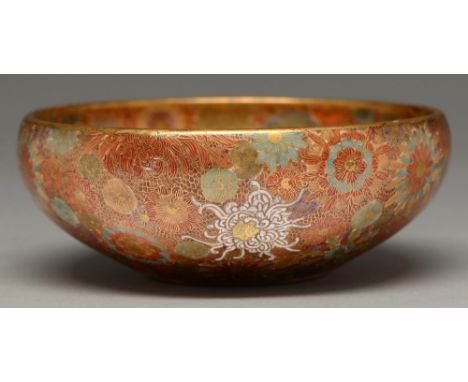 A Satsuma ware bowl, early 20th c, of rounded form and enamelled and gilt with densely packed flowers, 15.5cm diam, gilt sign
